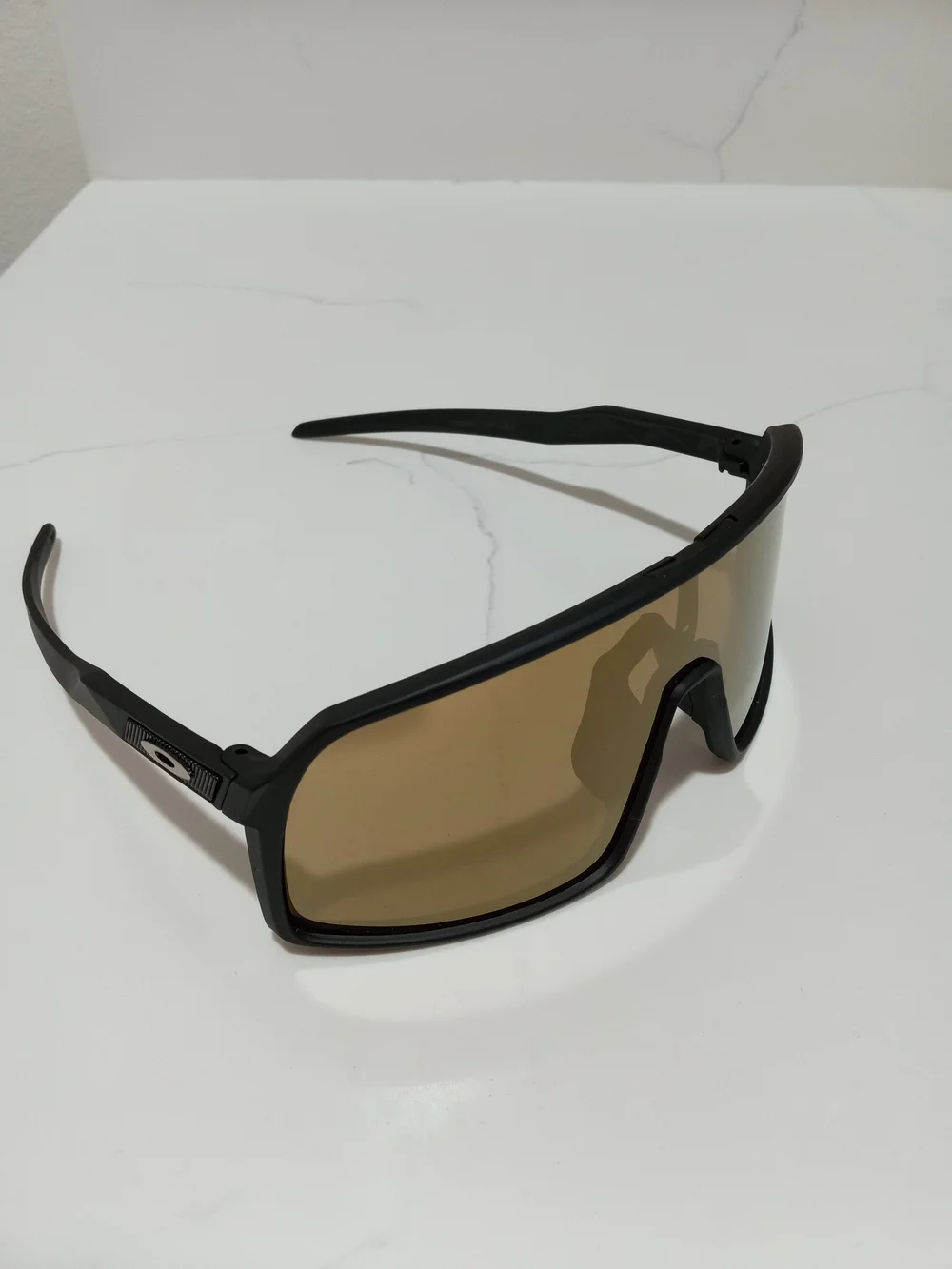 Oakley Black Frame Sunglasses with Brown Lenses